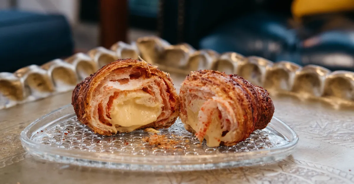 Koffeteria signature dishes Hot Cheeto Croissant, Fried Rice Danish, Mango Sticky Rice, Beef Pho Kolache, and Pistachio Baklava Croissant